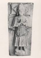 A carving of a medieval Monastic Mason found in the wall of the Cathedral in 1914, his heavy maul and square are visible.